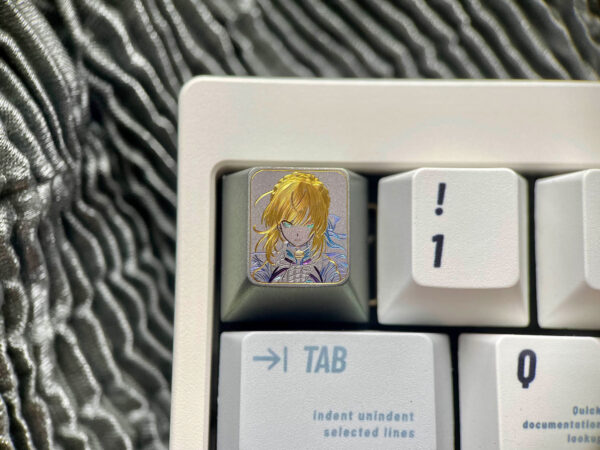 Saber hand-carved colored titanium keycaps
